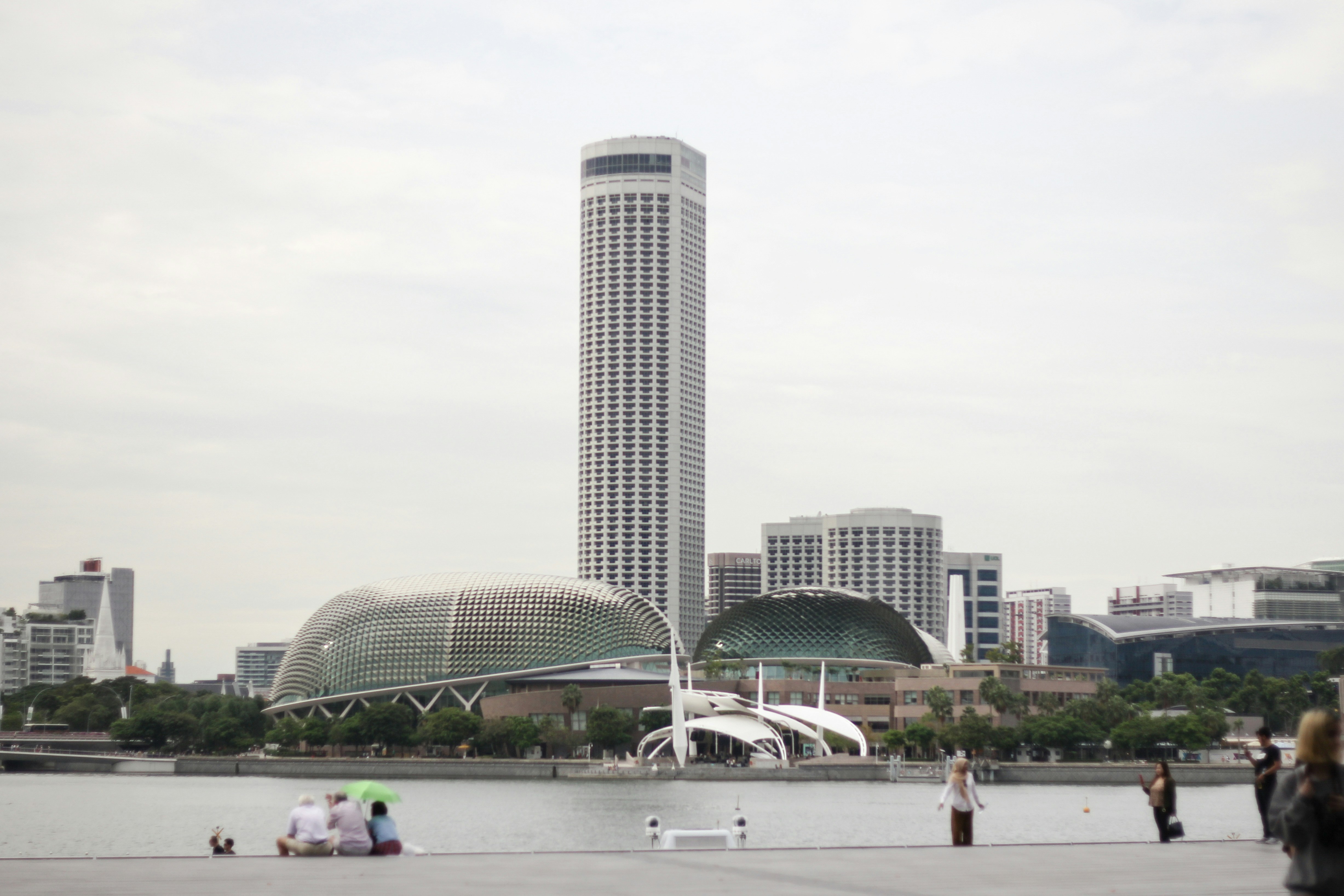 city buildings near body of water during daytime