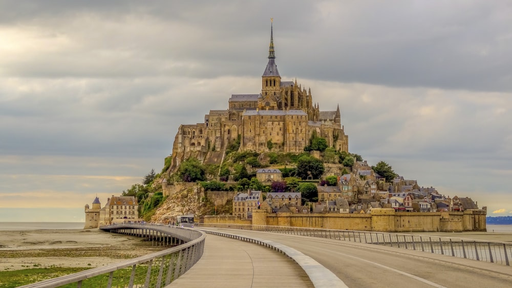 gold castle under grey sky