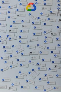 white-and-blue digital tags on white surface