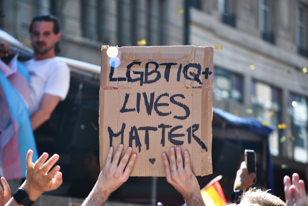 shallow focus photo of LGBTIQ+ Live Matter signage