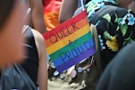 selective-focus of photography of Queer & Proud signage