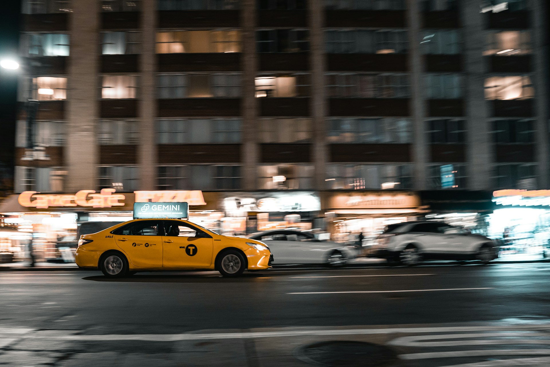 yellow cab on road
