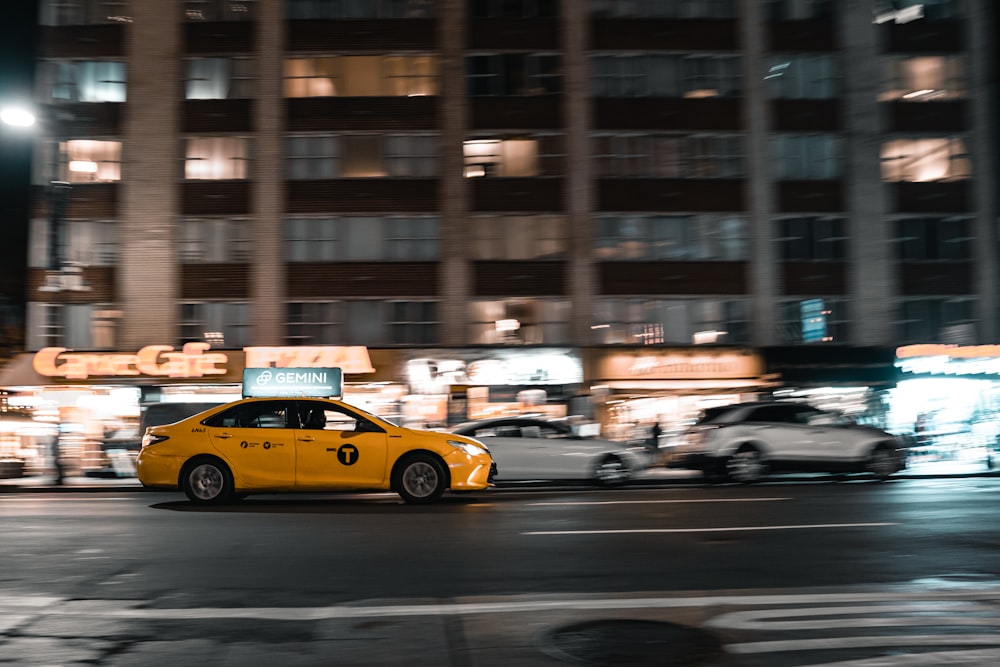 yellow cab on road