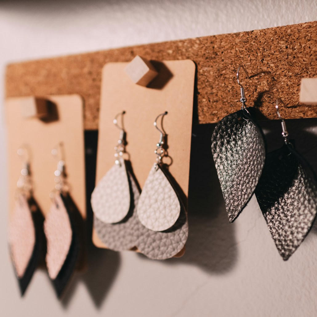 three pairs of silver hook earrings