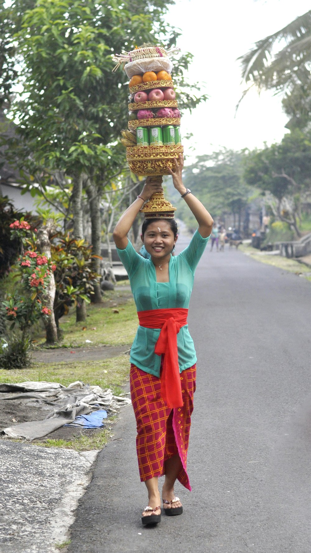 woman carrying baskets