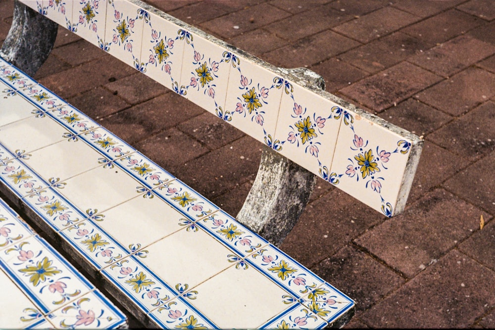 white and blue floral bench