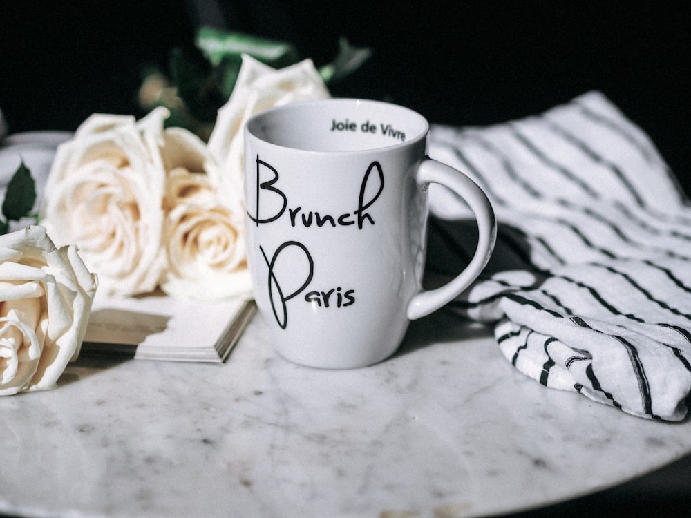 white mug on table