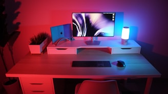 Modern blue light glasses glowing softly against a minimalist desk setup.