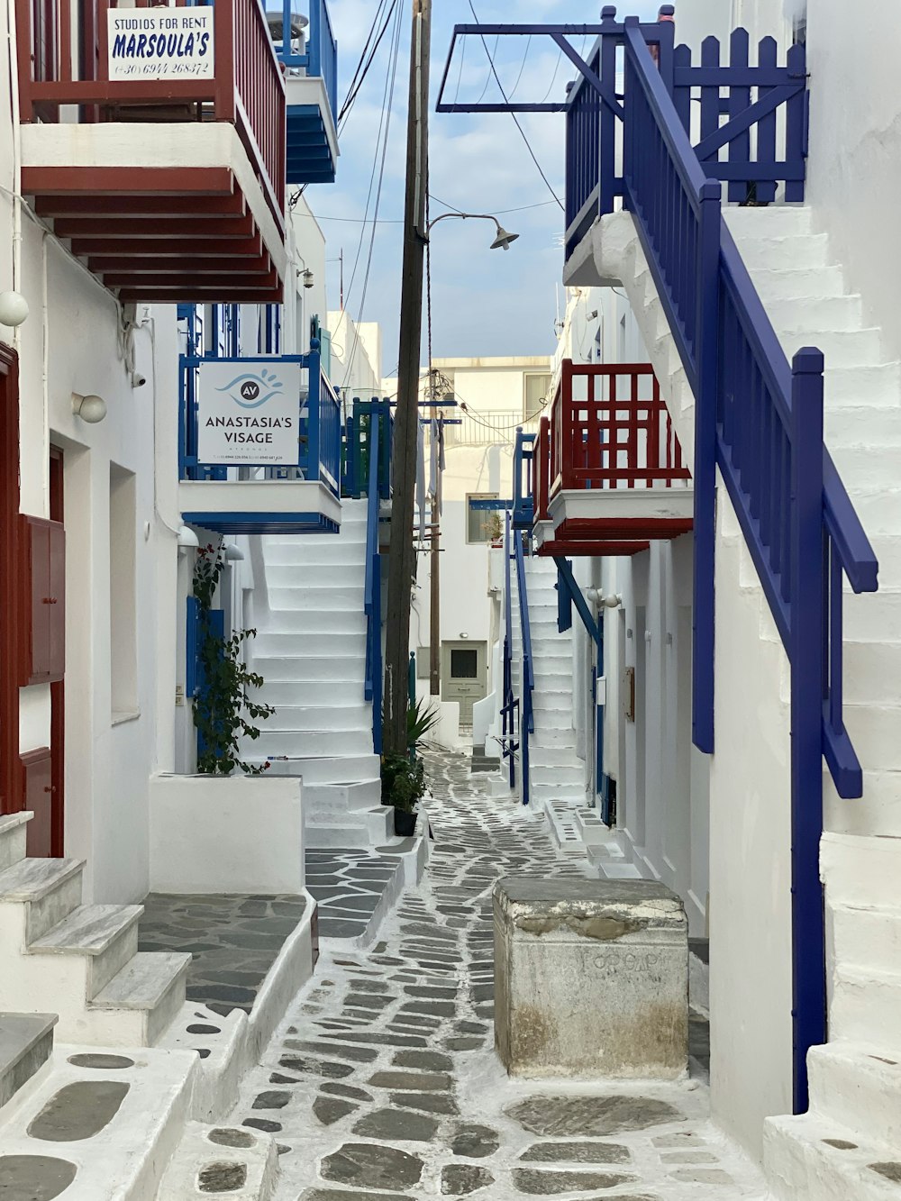 view photography of white, red, and blue concrete building