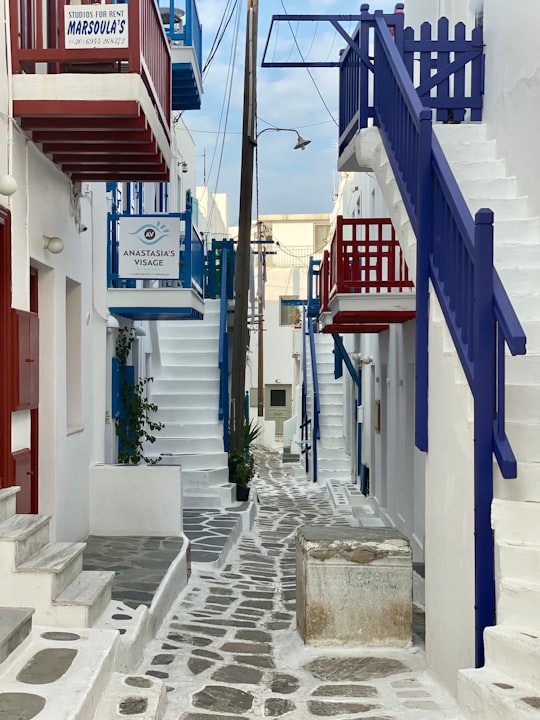 view photography of white, red, and blue concrete building in Mýkonos Greece