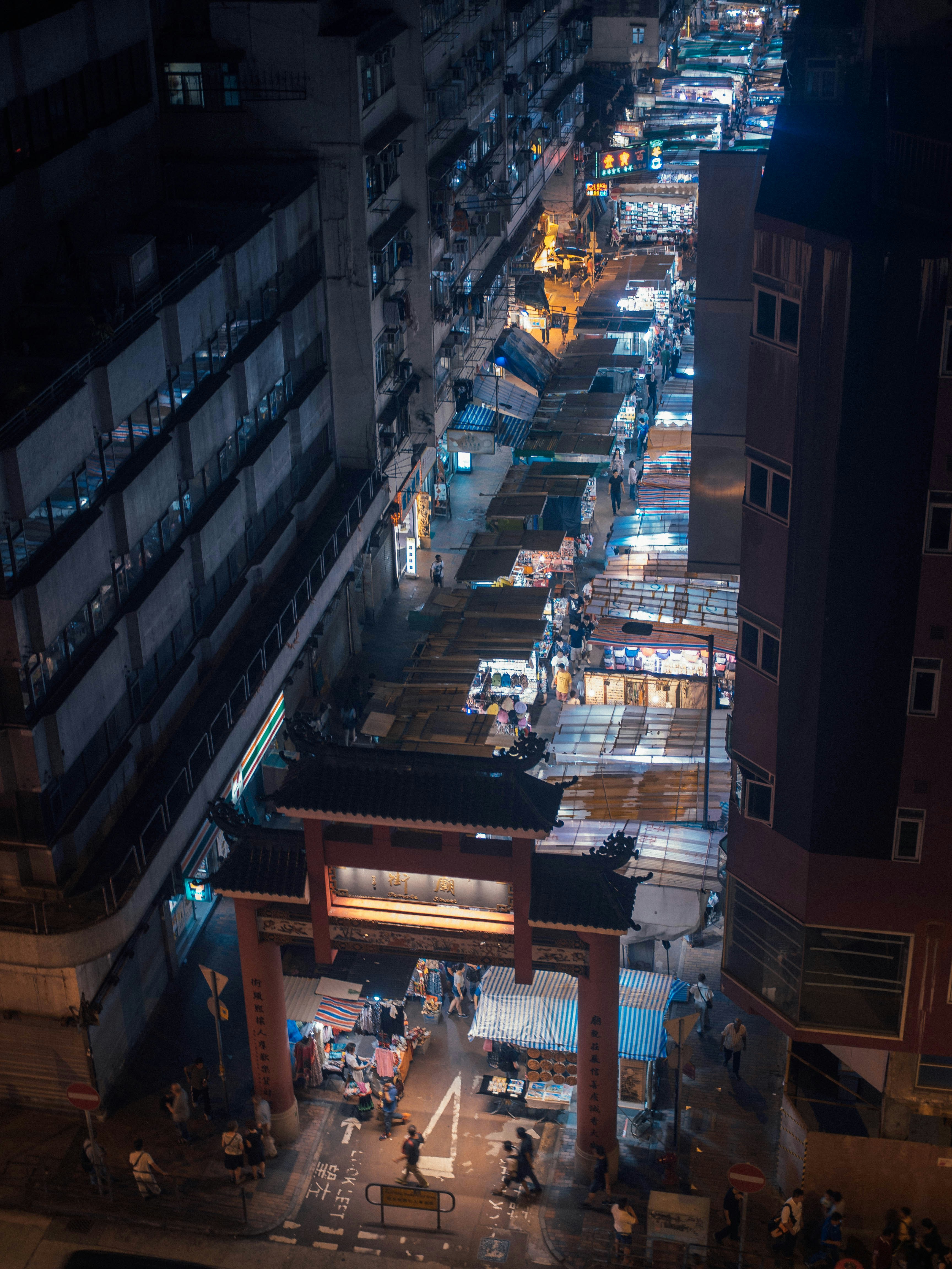 people on road near buildings
