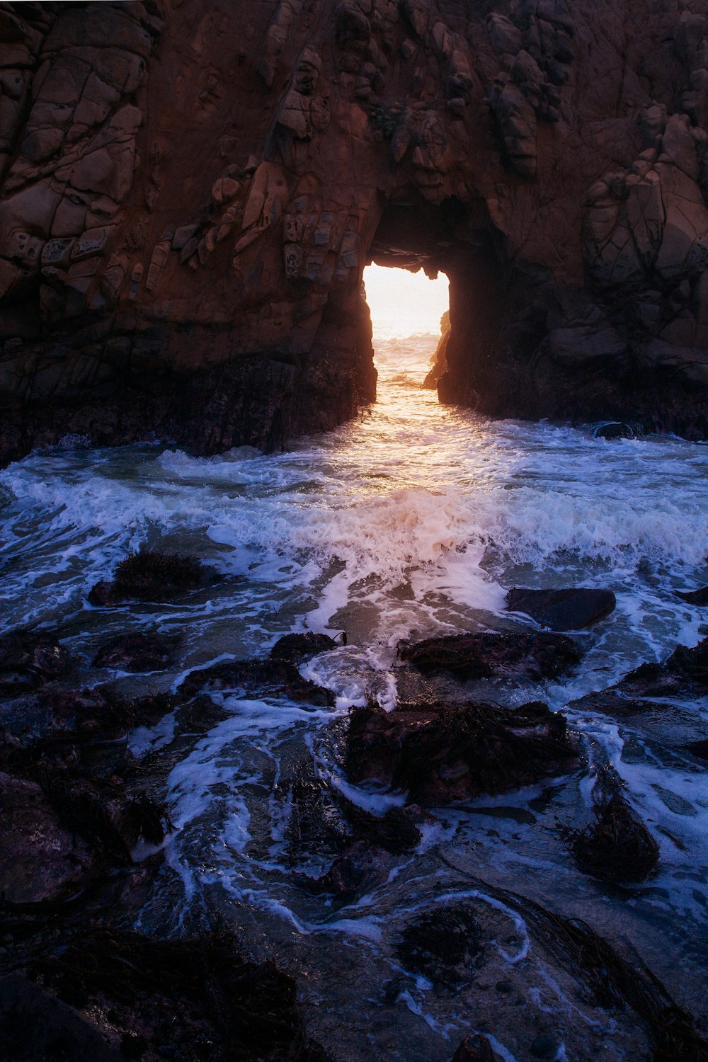 beach surrounded by rocky mountain