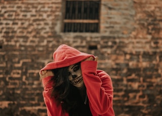 man in red pullover jacket