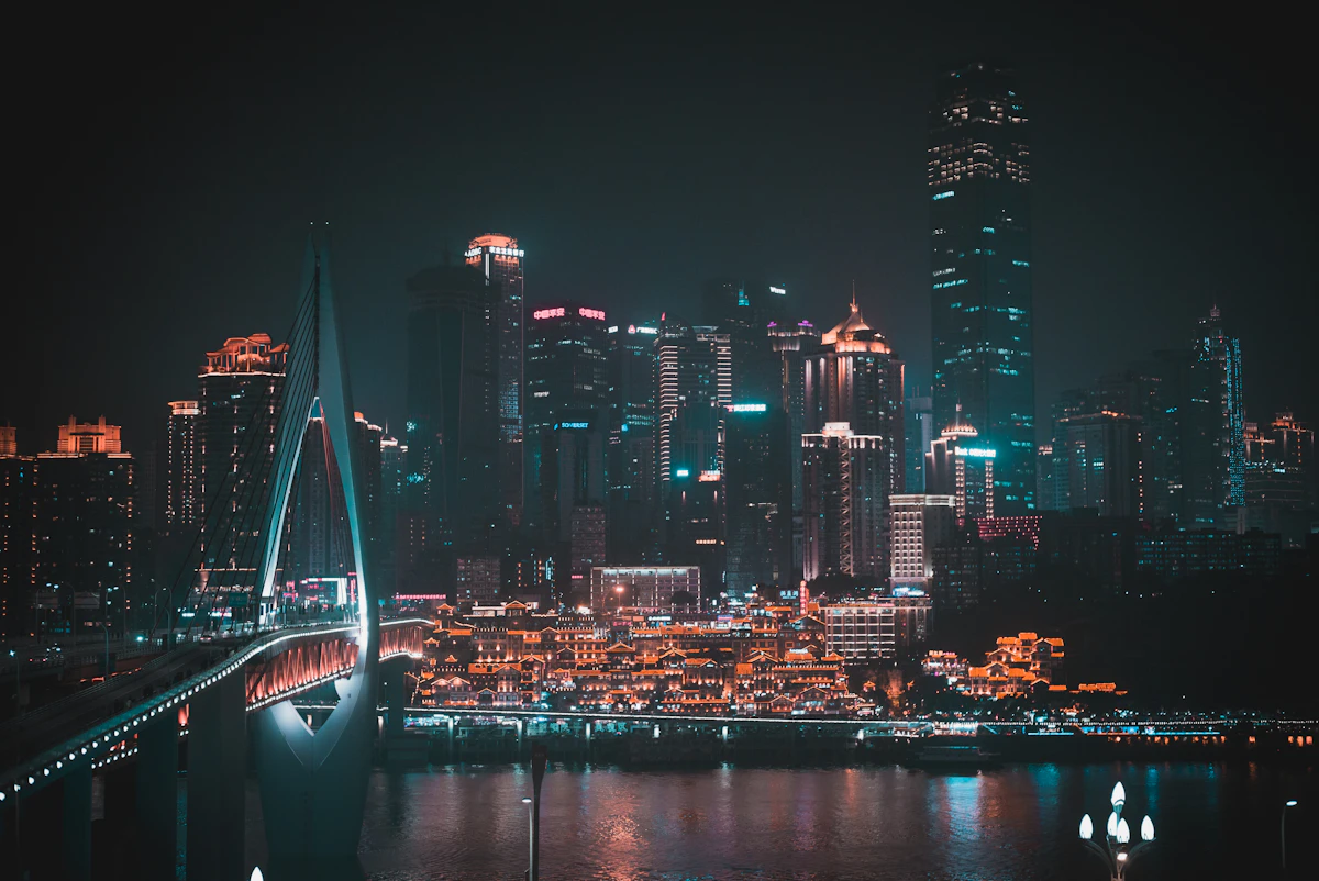 Hongyadong neon skyline reflected on the river at night