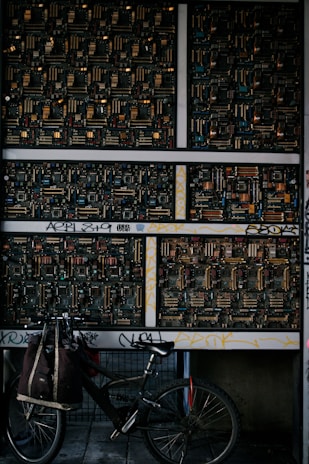 An unusual wall art piece in the office made from recycled circuit boards, adding tech flair.