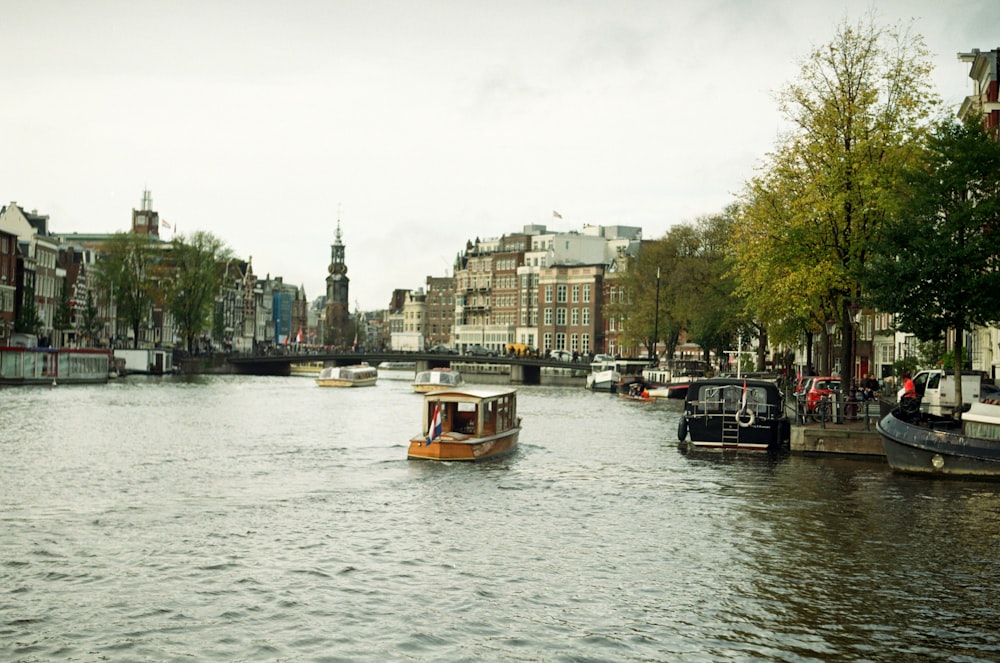 brown boat on the body of water photograph