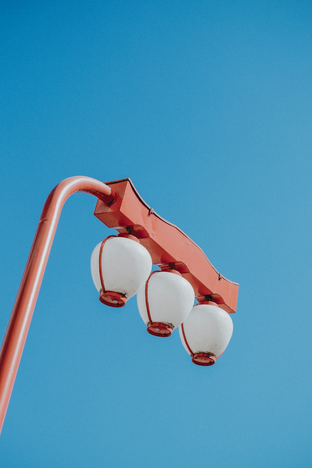 red and white lamp post