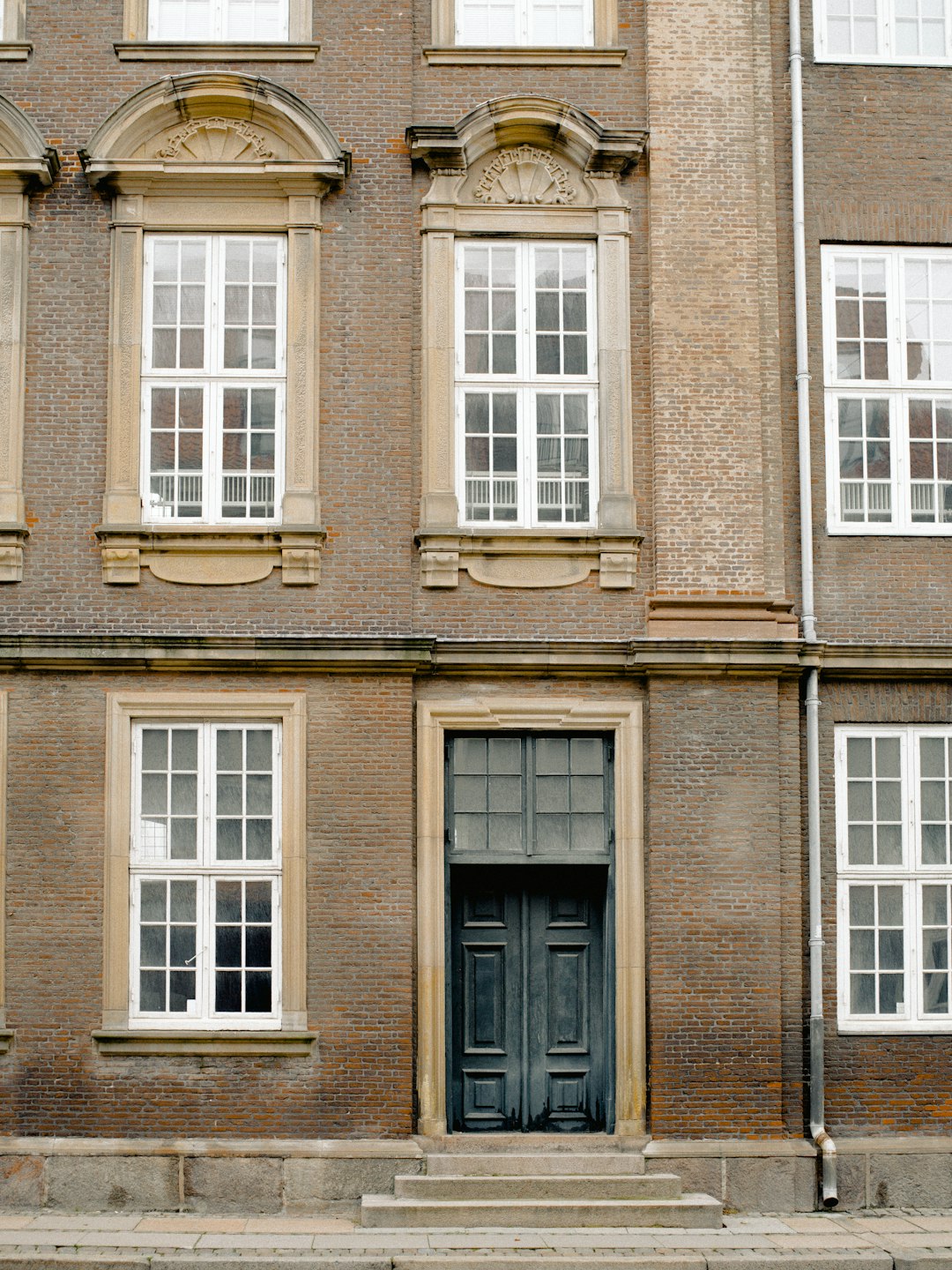 white framed glass window building