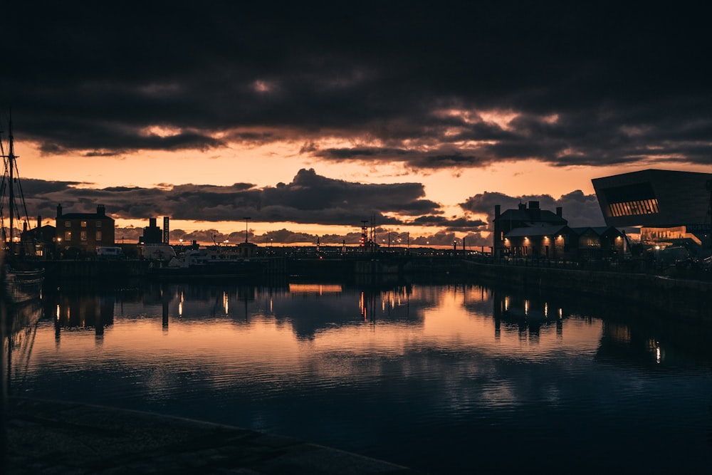 calm body of water during sunset