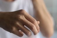 Close-up of a gentle hand being examined, highlighting care and attention.