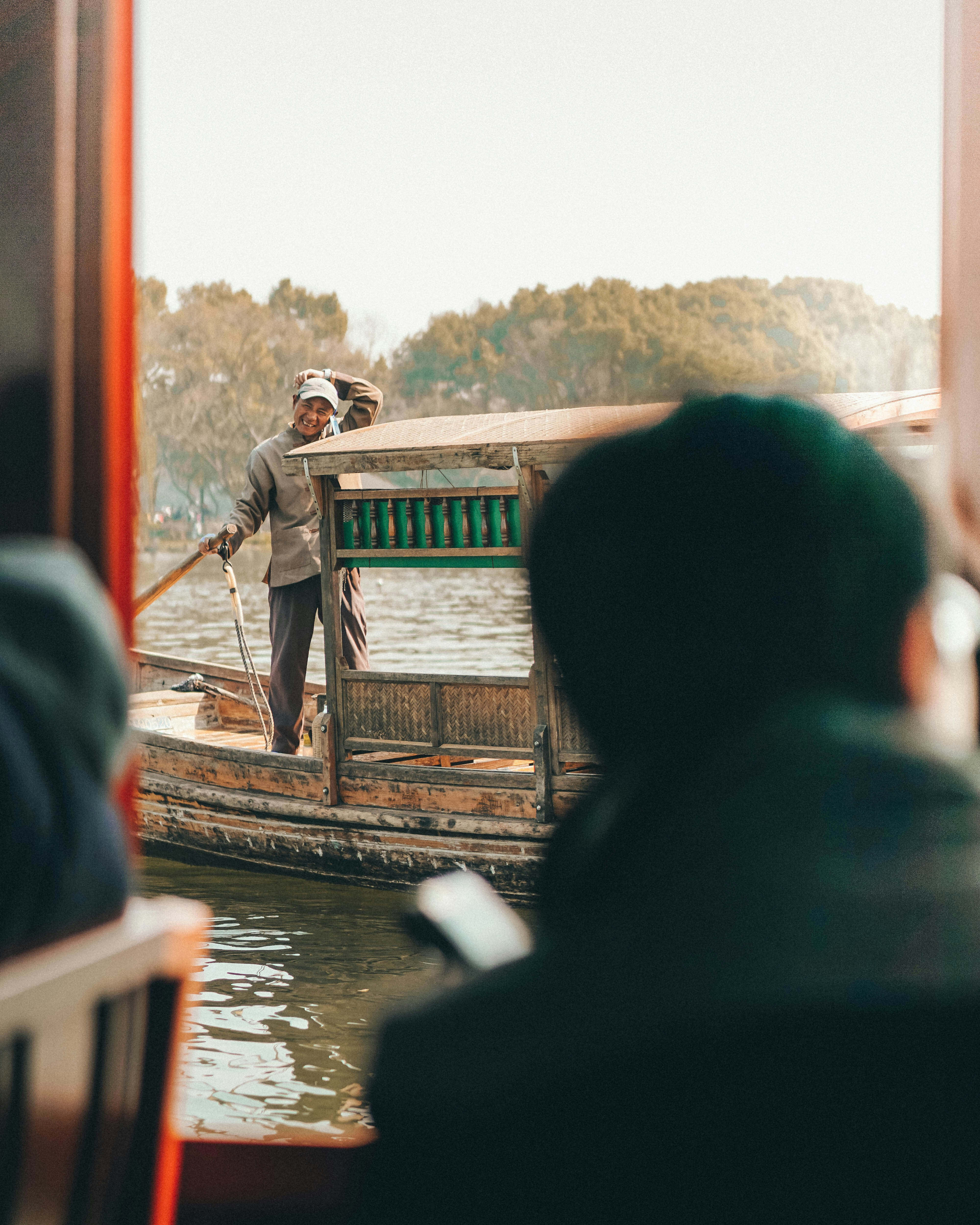 man on boat on body of water