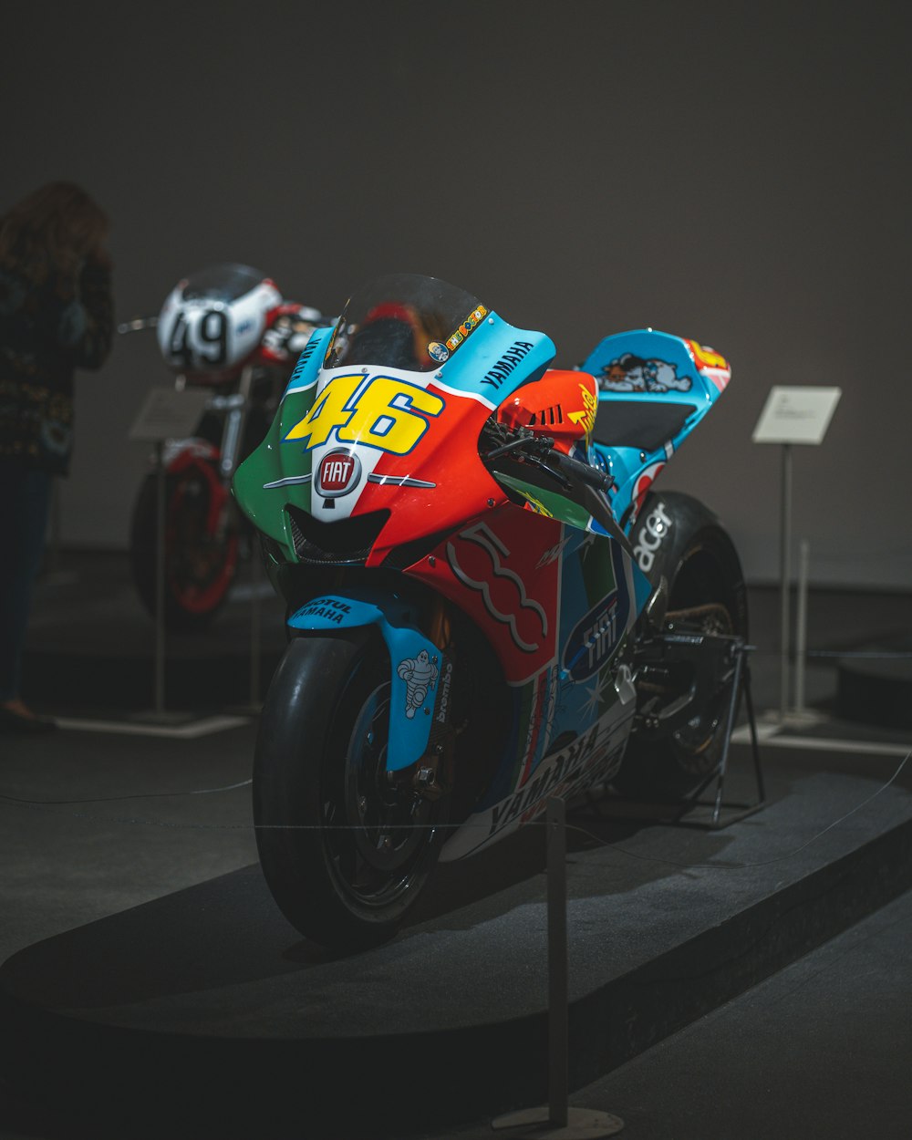 green, white, white, and blue race bike