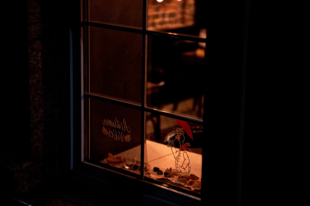 close-up photo of black framed glass window