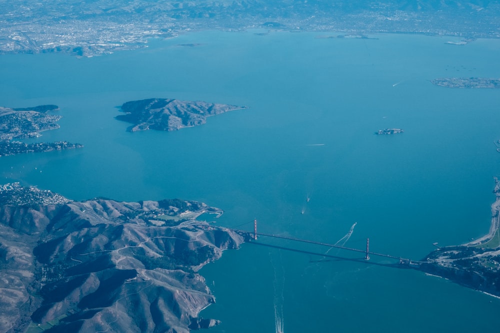 aerial view of mountains and islet during daytime