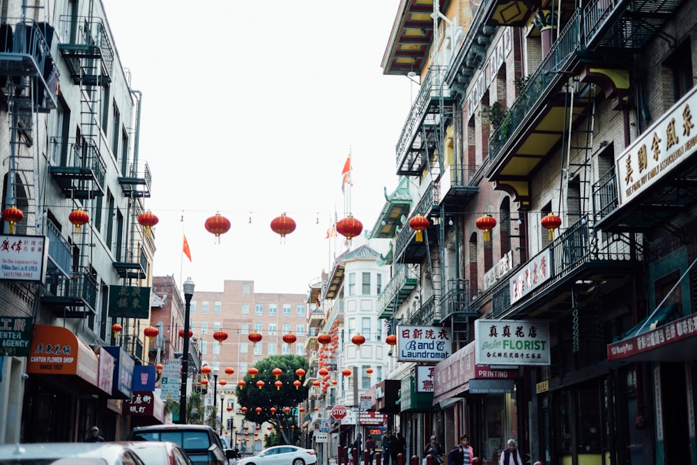 red lanterns hanged between the buildings