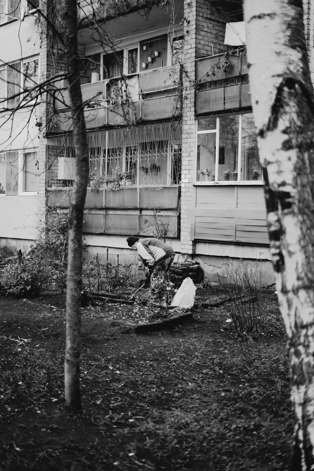 a black and white photo of an abandoned building