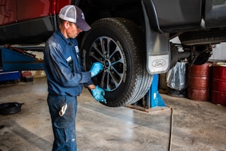 man holding lug wrench