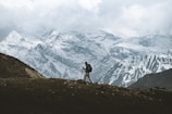 Trekkers hiking the scenic trail to Triund in the Himalayas, with breathtaking mountain views