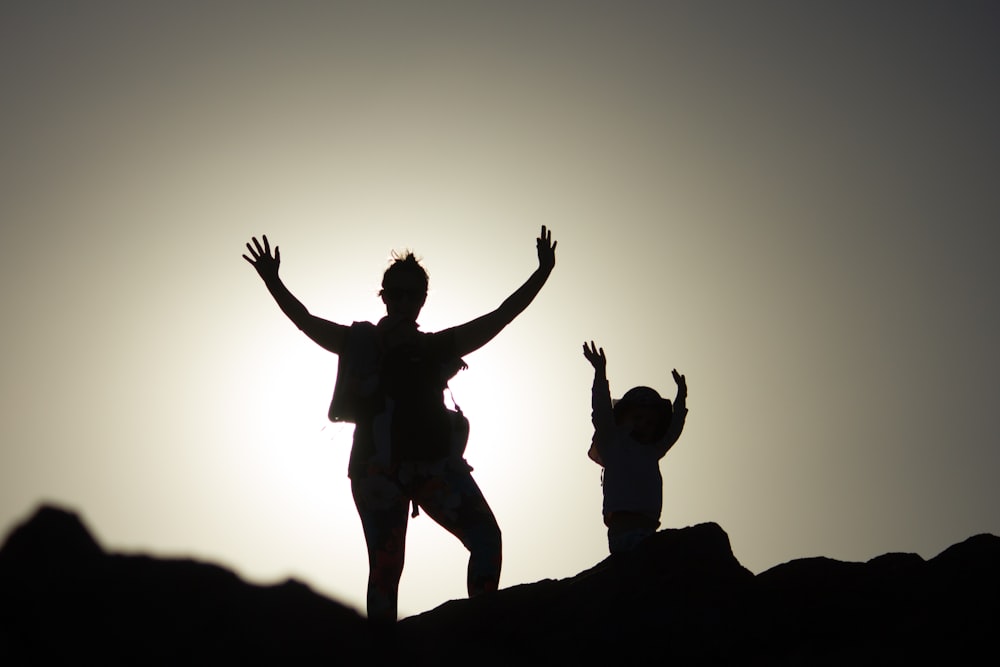 silhouette photo of two person