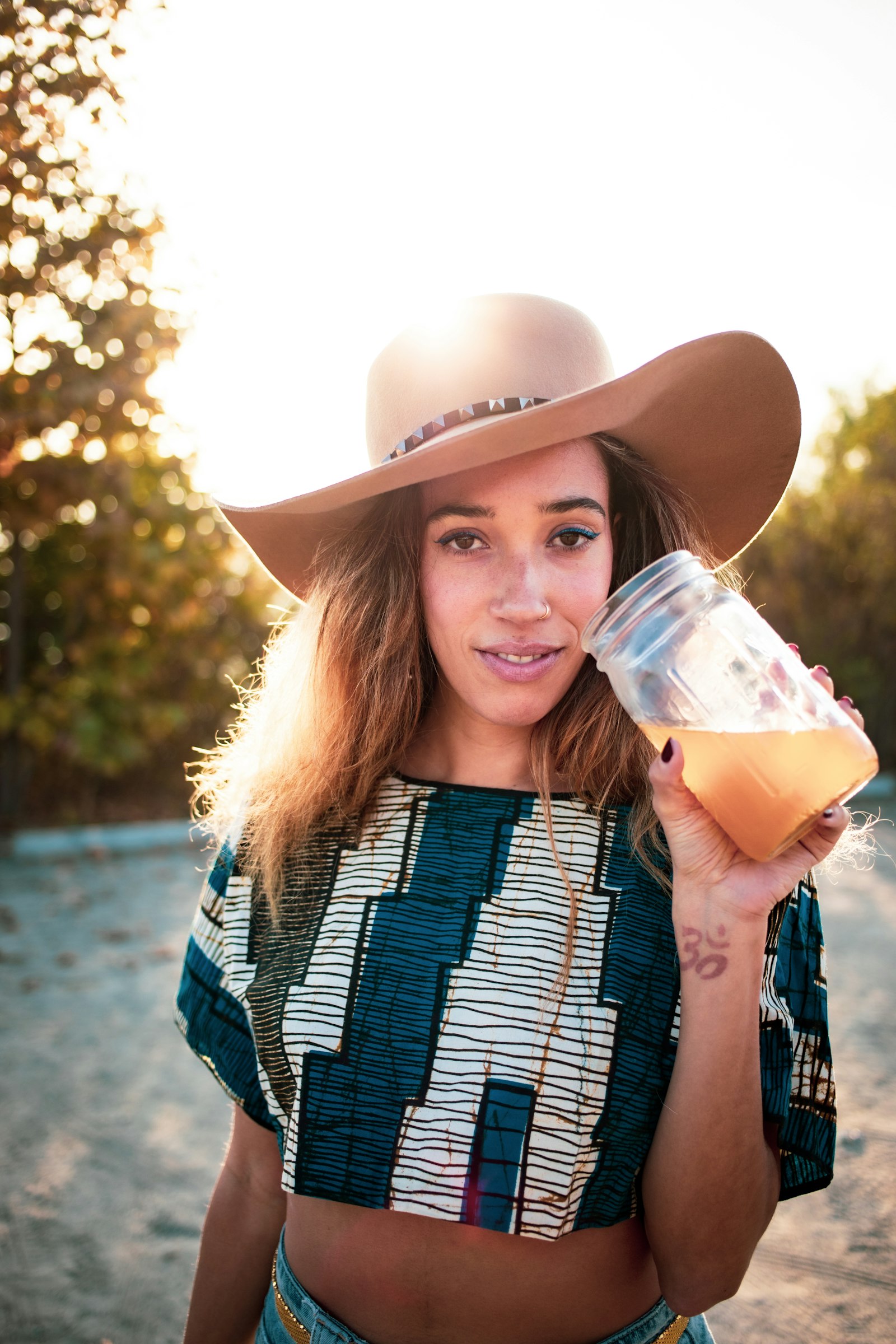 Canon EOS 5D Mark IV + Canon EF 40mm F2.8 STM sample photo. Woman holding clear jar photography