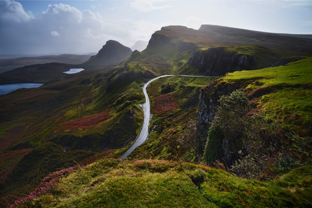 aerial photography of road overlooking mountain ridge