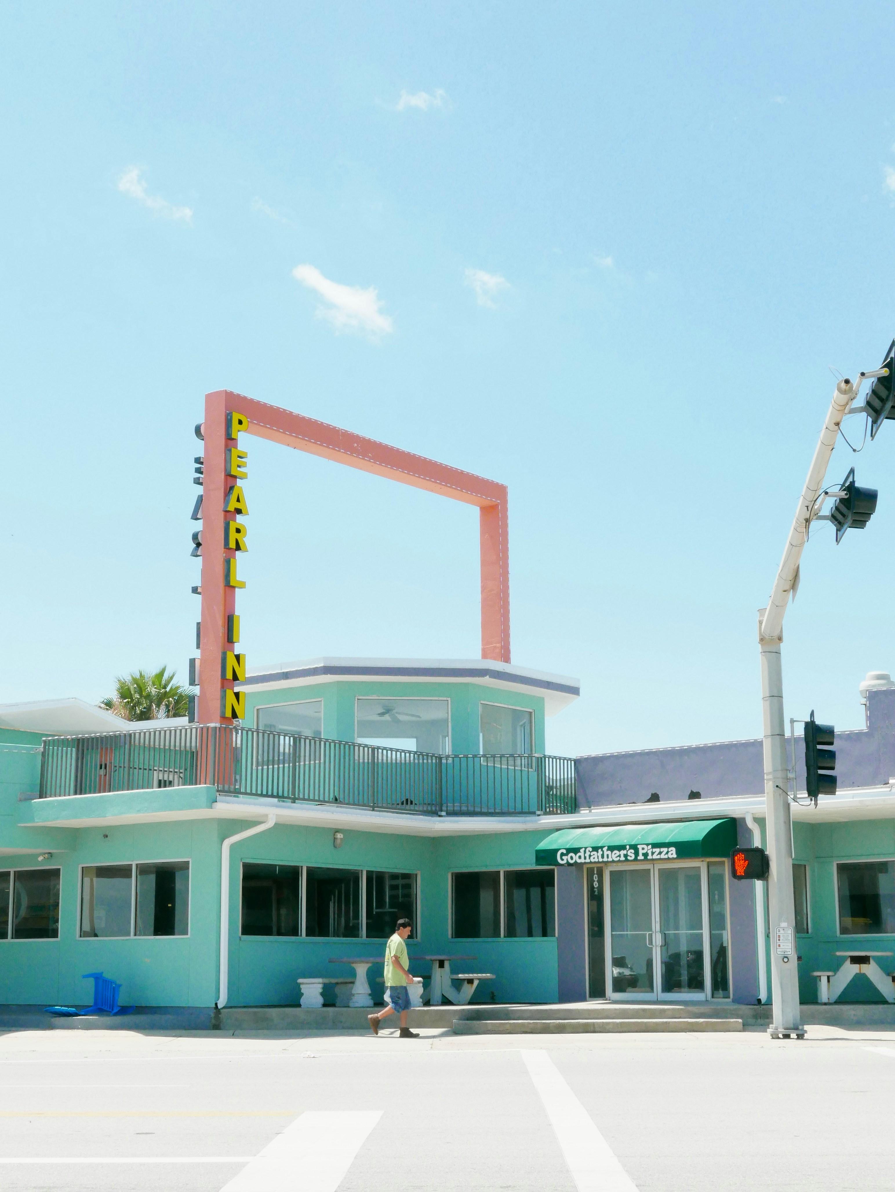 architectural photography of blue and white concrete building