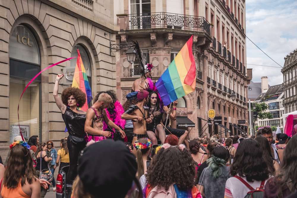 a group of people that are standing in the street