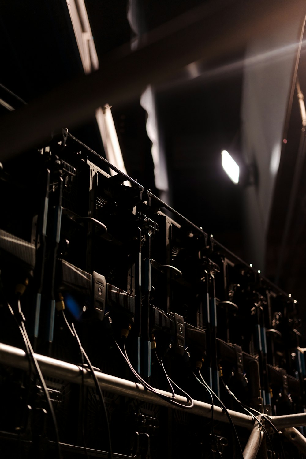 selective focus photo of five rectangular black speakers