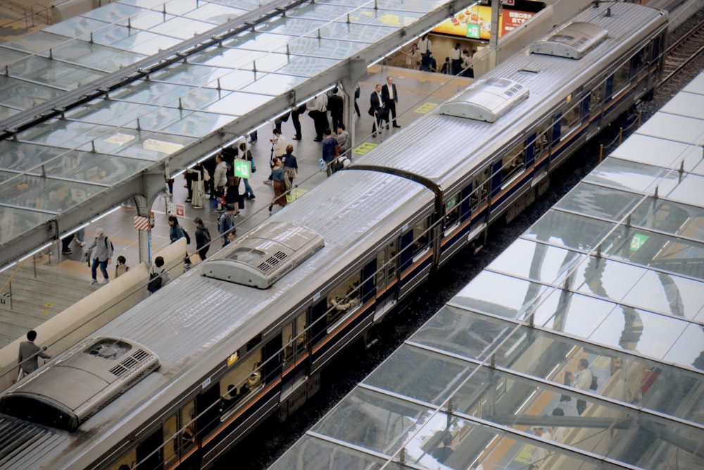 aerial photo of people near train