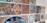 A collection of colorful, intricately designed mosaic tiles arranged on a wall. Each tile displays a distinct geometric or floral pattern, rich in detail and vibrant in colors, showcasing artistic craftsmanship.