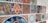 A collection of colorful, intricately designed mosaic tiles arranged on a wall. Each tile displays a distinct geometric or floral pattern, rich in detail and vibrant in colors, showcasing artistic craftsmanship.