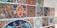 A collection of colorful, intricately designed mosaic tiles arranged on a wall. Each tile displays a distinct geometric or floral pattern, rich in detail and vibrant in colors, showcasing artistic craftsmanship.