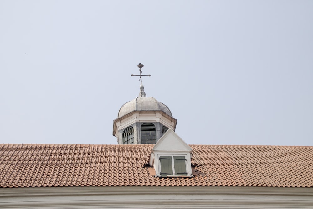 brown and white building under white sky