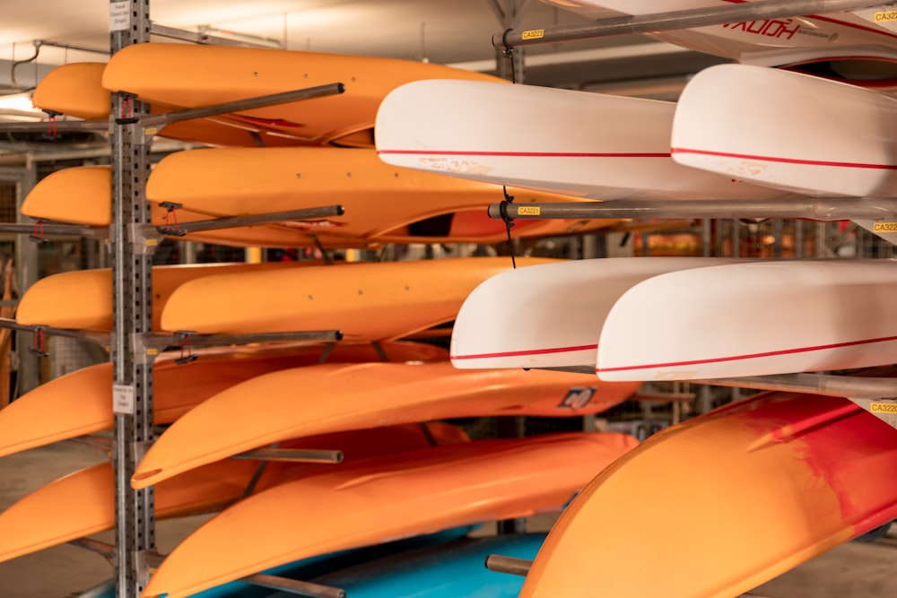 a bunch of surfboards that are on a rack