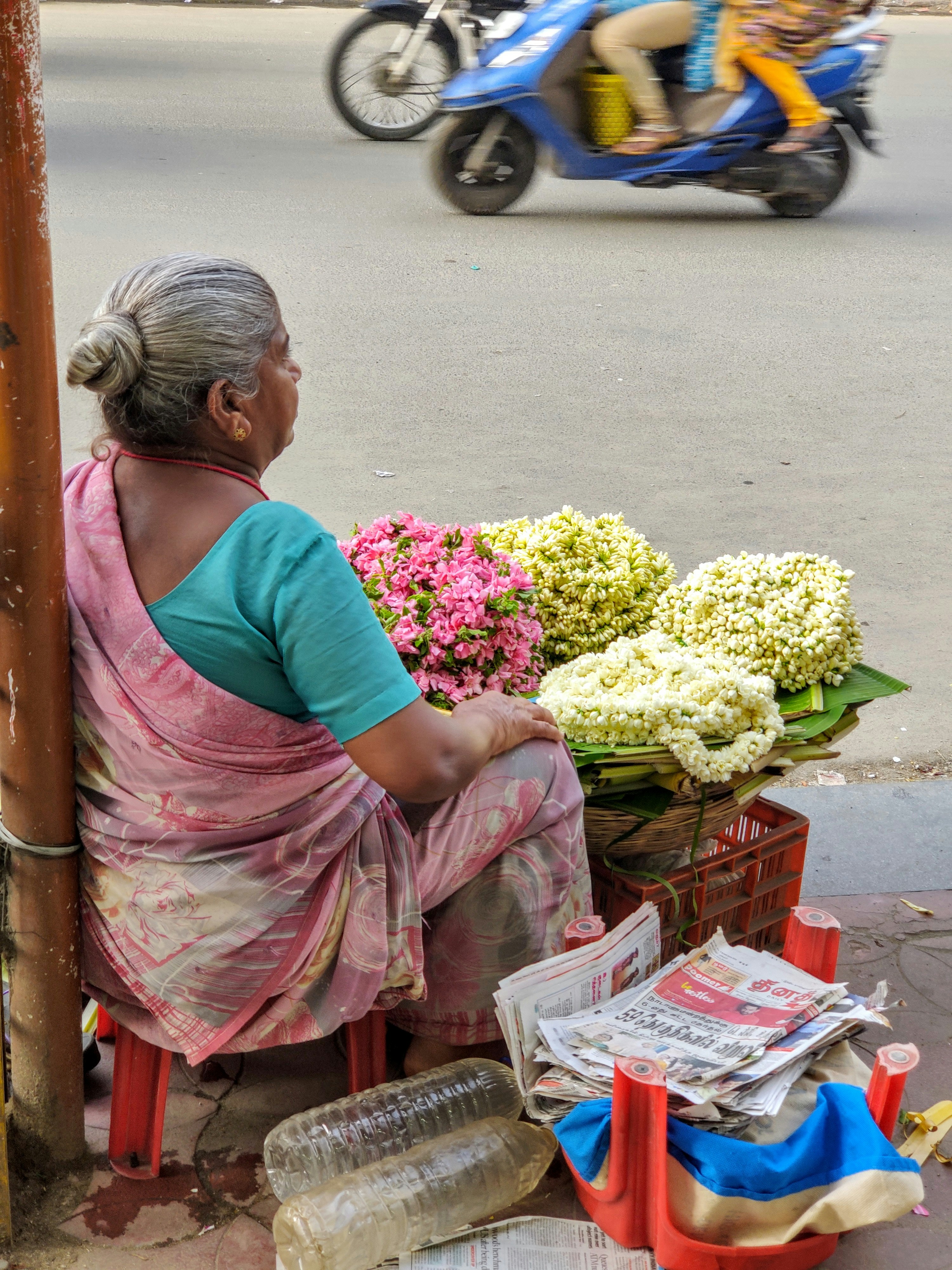 woman selling flowers
