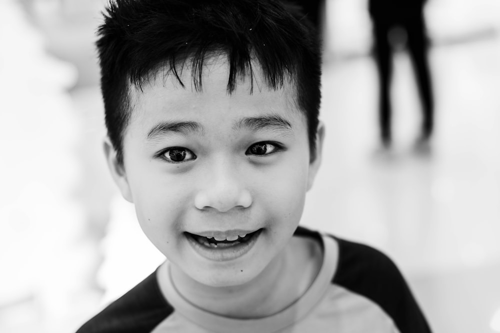 grayscale photography of boy