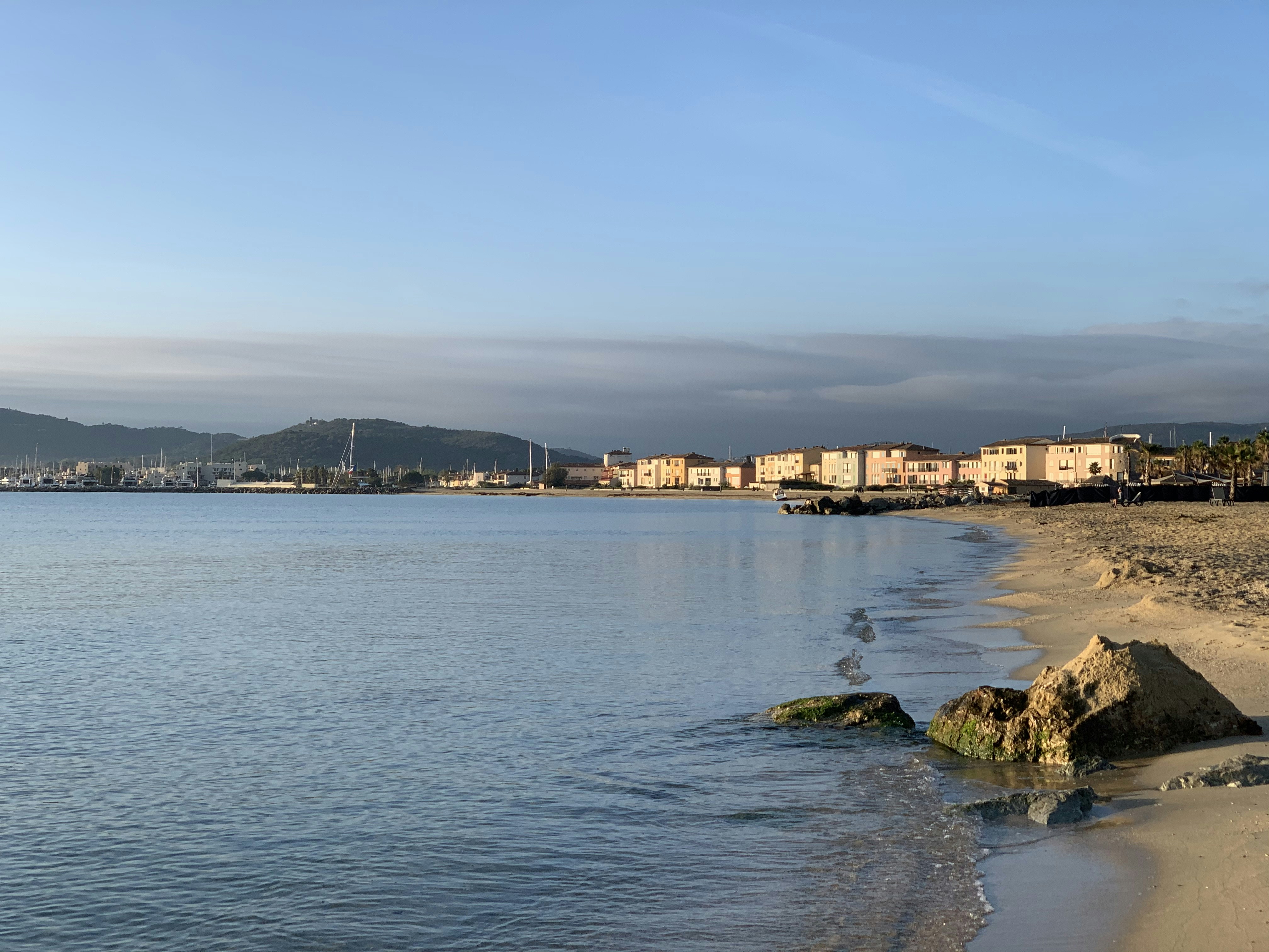Buildings on shore during day