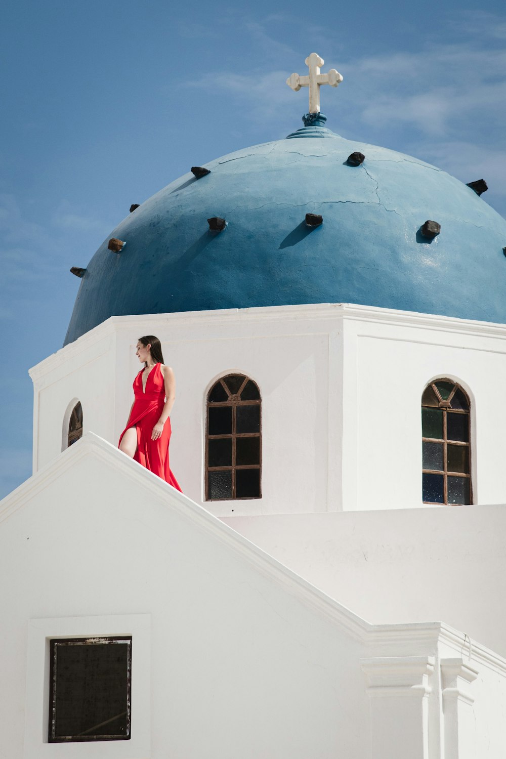 woman in red sleeveless dress