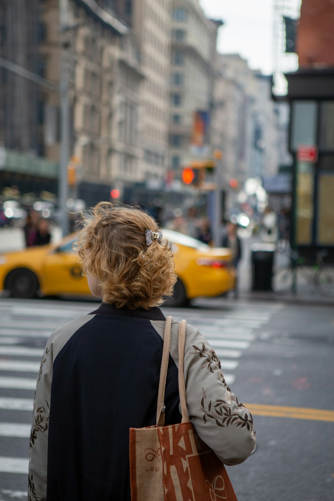 woman crossing road