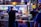 A bustling street scene showcasing vendors preparing delicious street food.